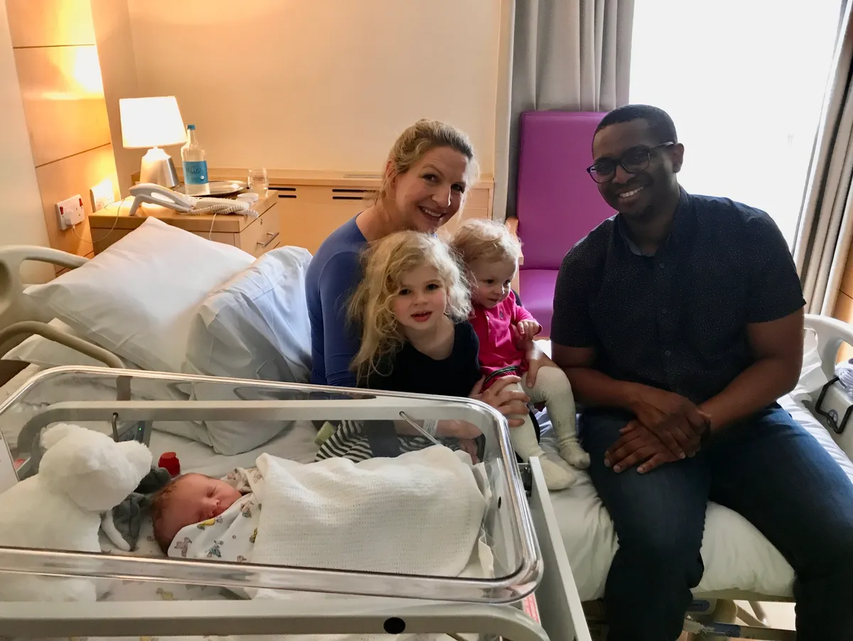 Mr Subair with happy family and newborn